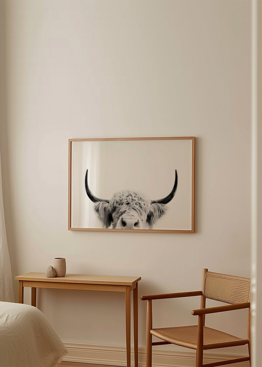 Peeking cow BW - Framed poster in an interior