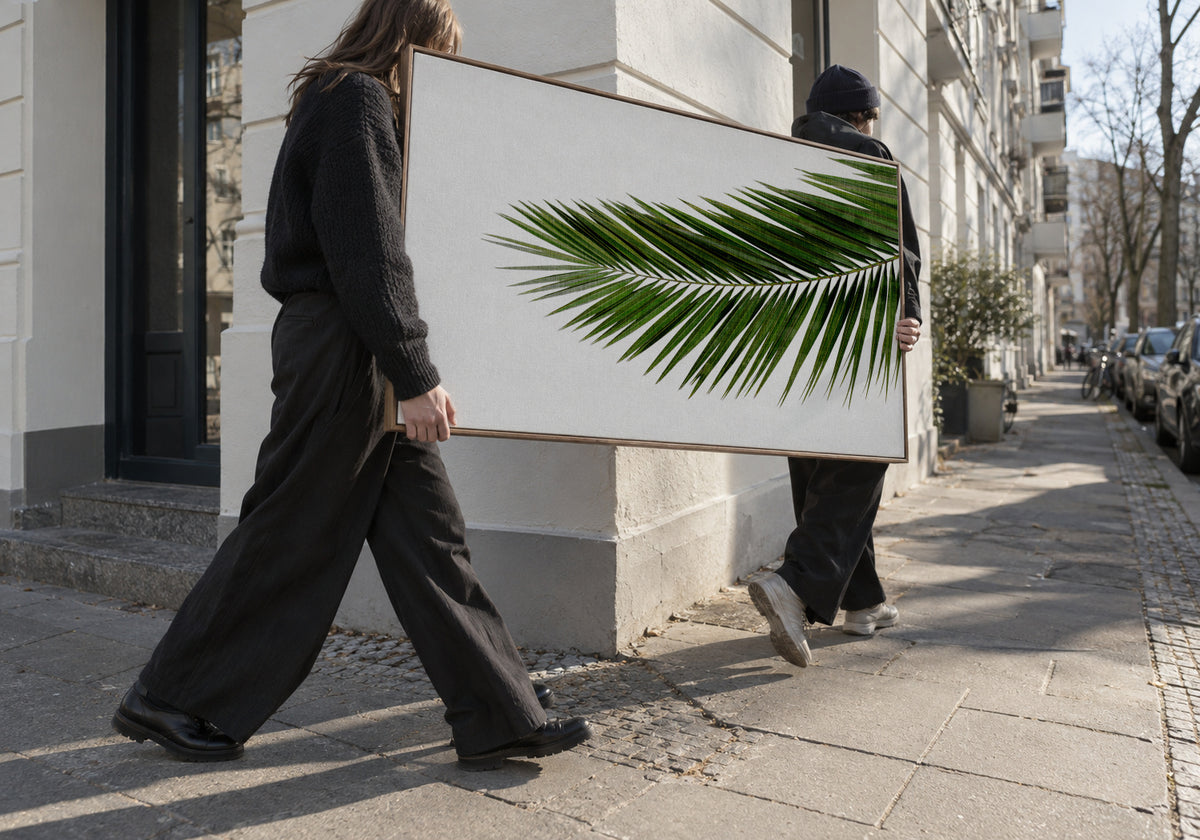Palm Leaf I - Framed canvas in an interior