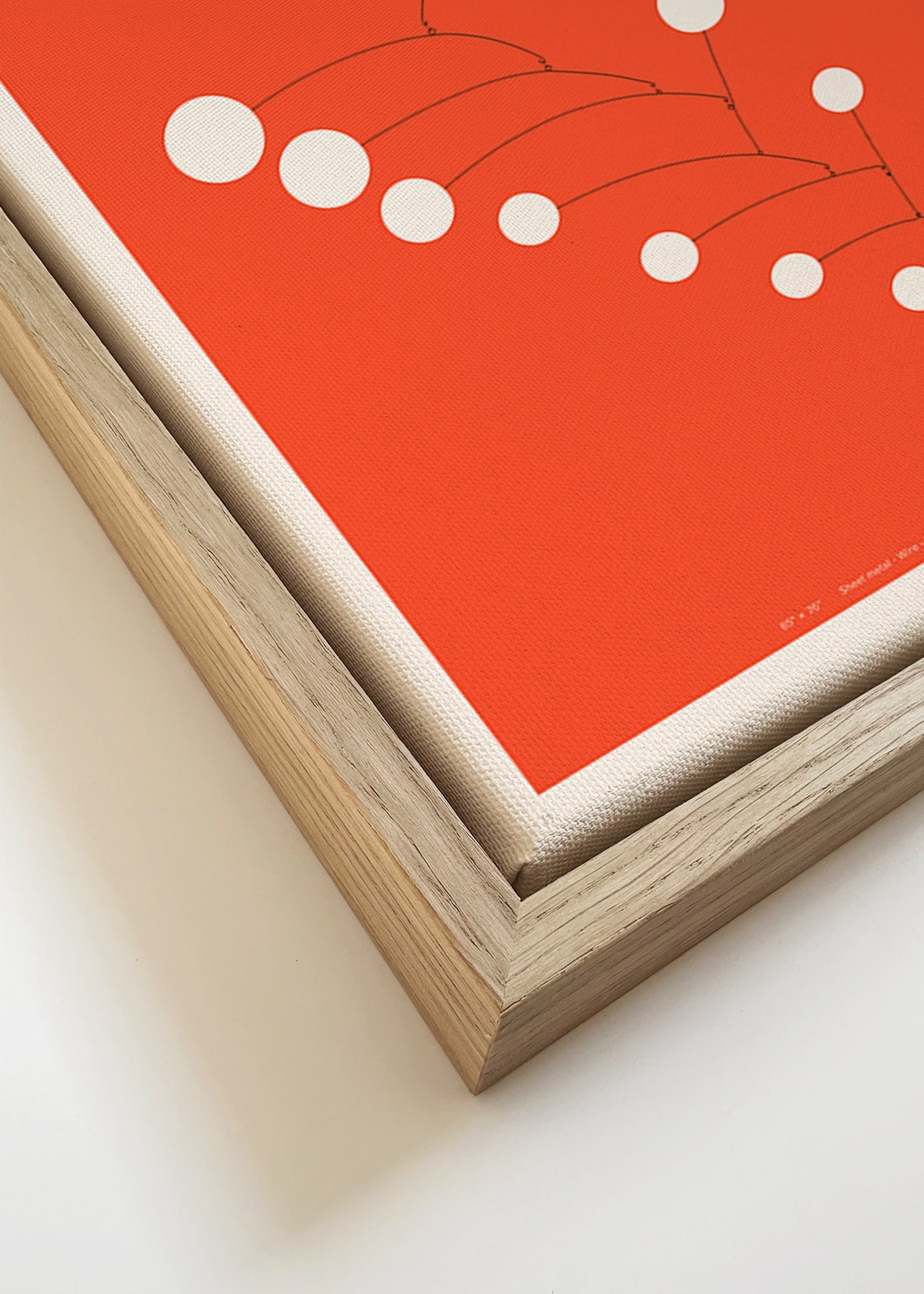 Abstract red mobile artwork with circles