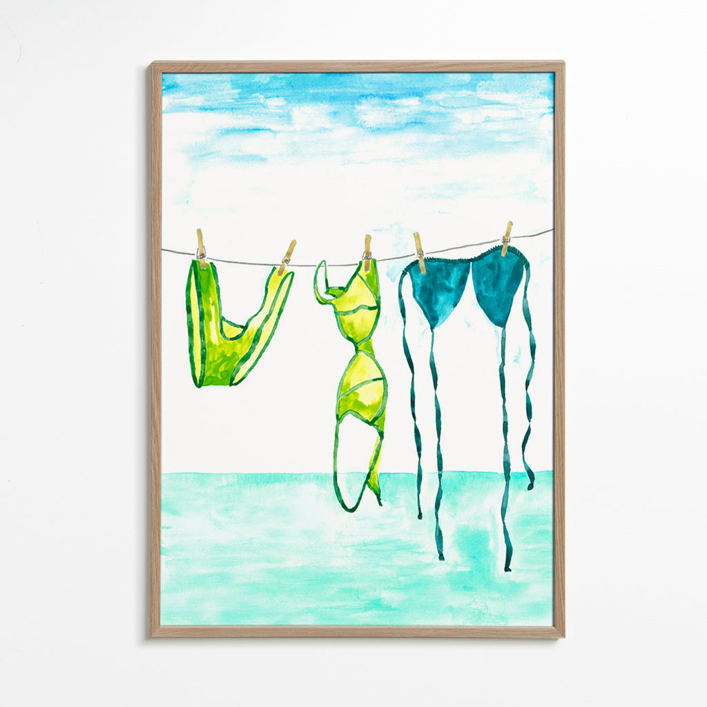 Illustration of hanging bikinis by the sea