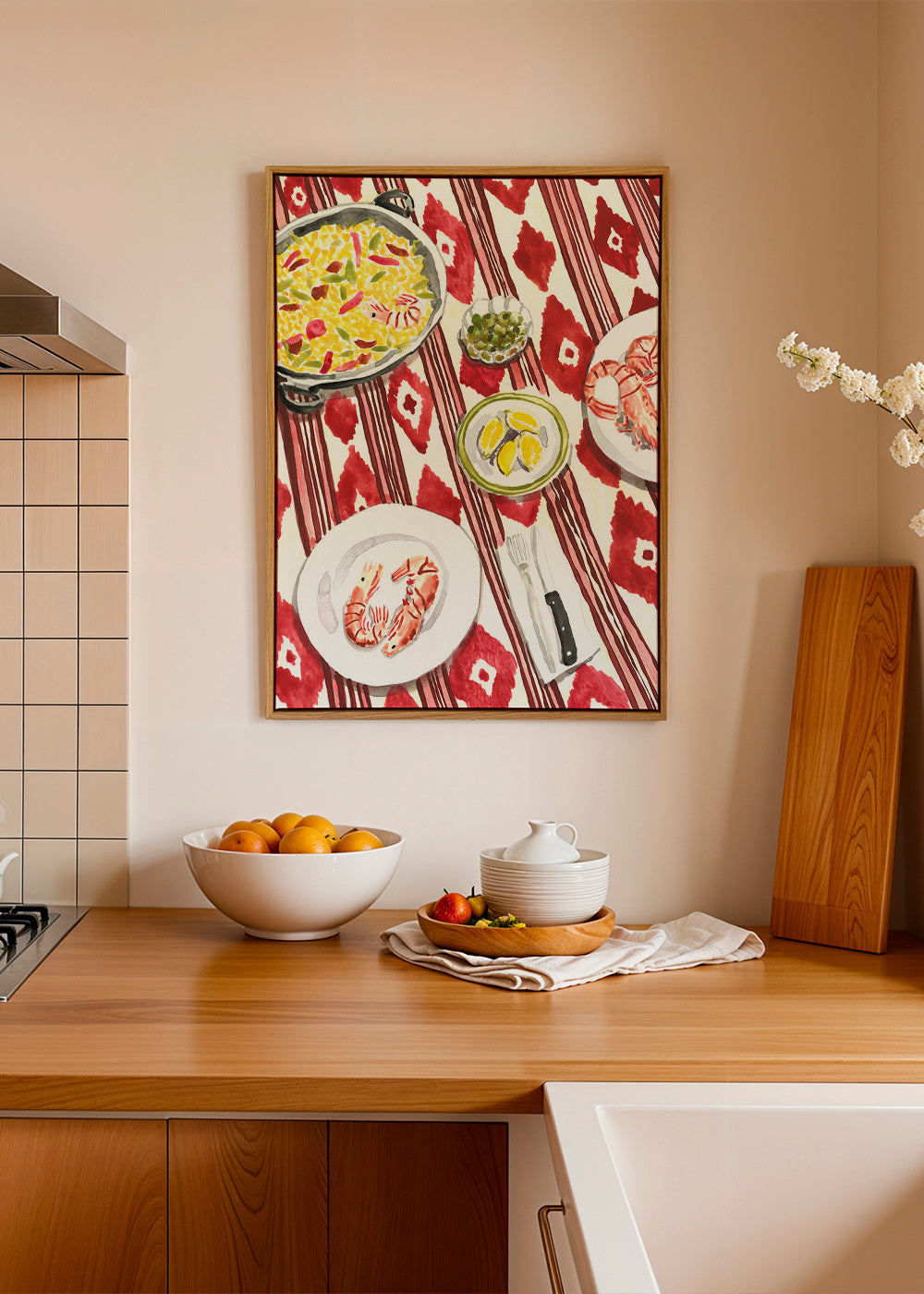 Kitchen art: paella and prawns on a patterned tablecloth