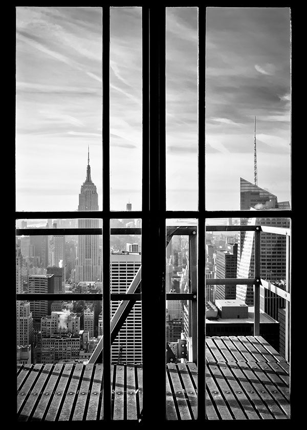 City photograph framed by window