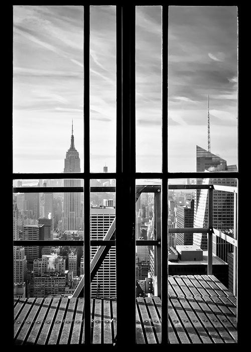 City photograph framed by window