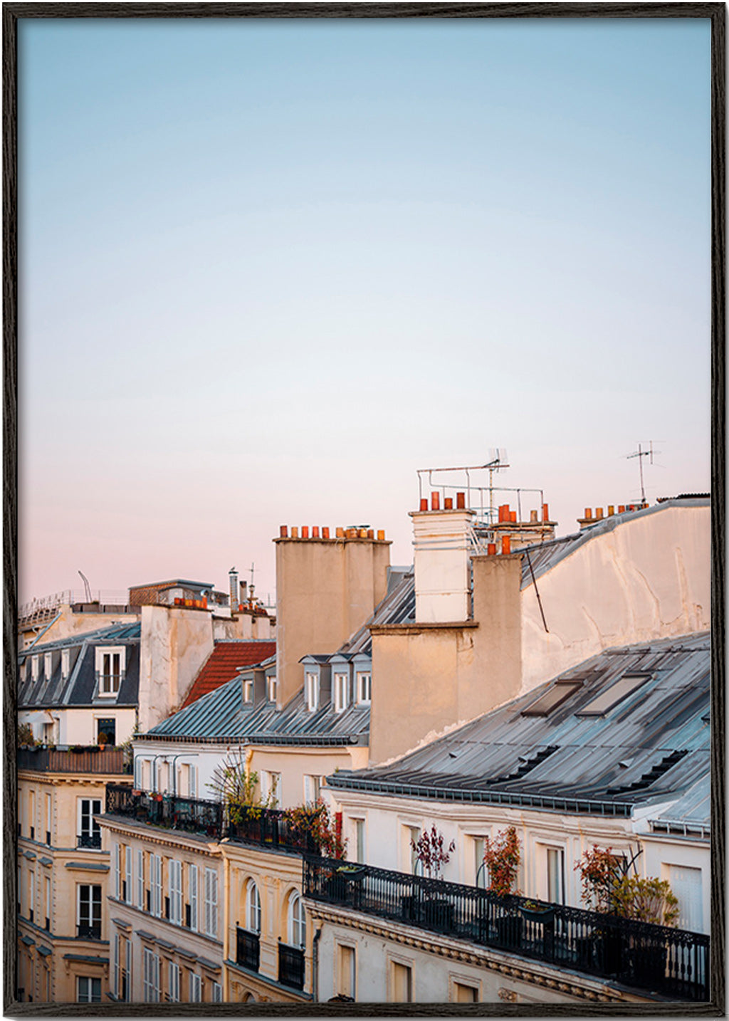 Travel poster of urban rooftops at sunrise – Black Frame
