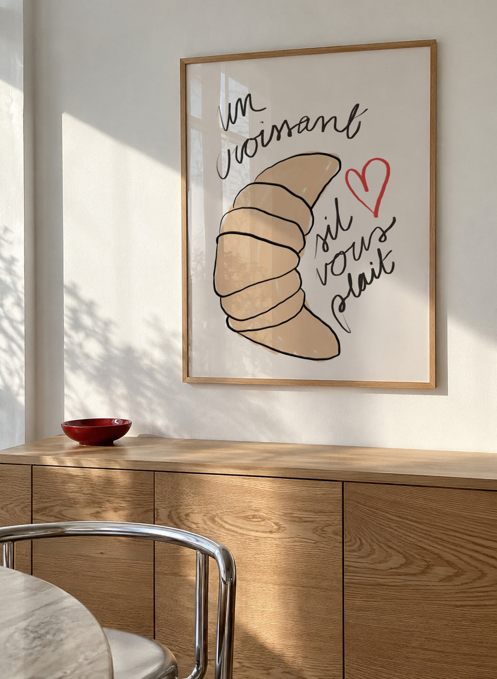 Un Croissant - Framed poster in an interior