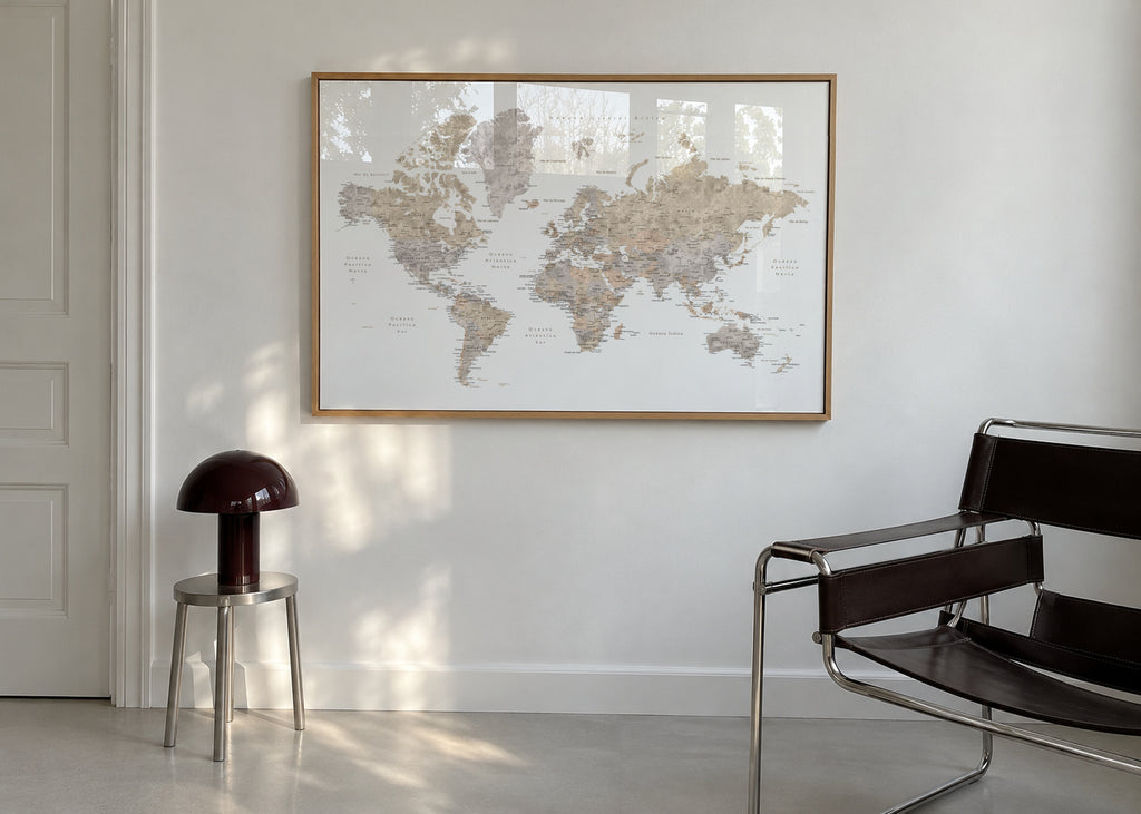 Detailed taupe watercolor world map with labels in Spanish, Abey - Framed poster in an interior
