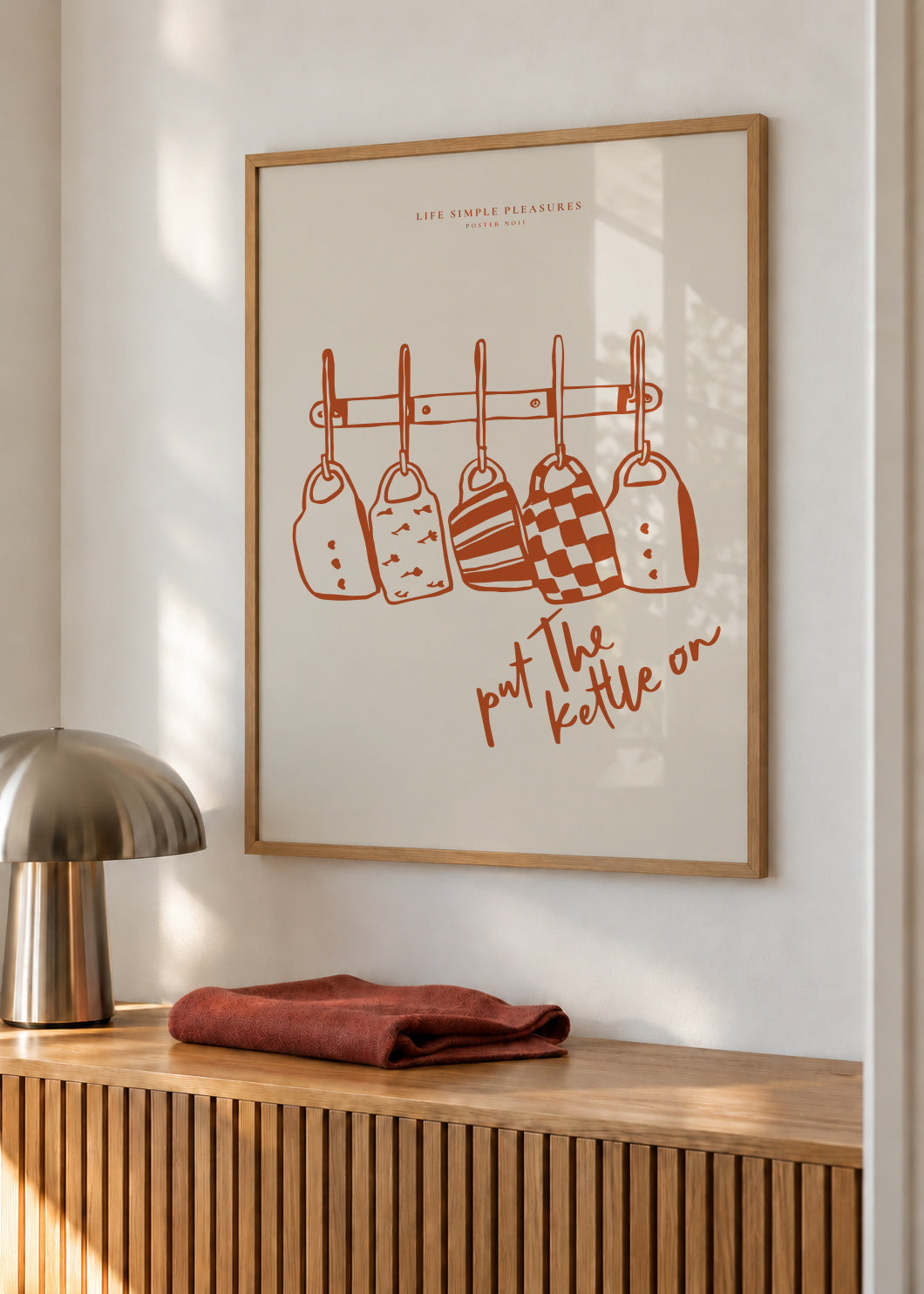 Life Simple simple pleasures - Put the kettle on - Framed poster in an interior