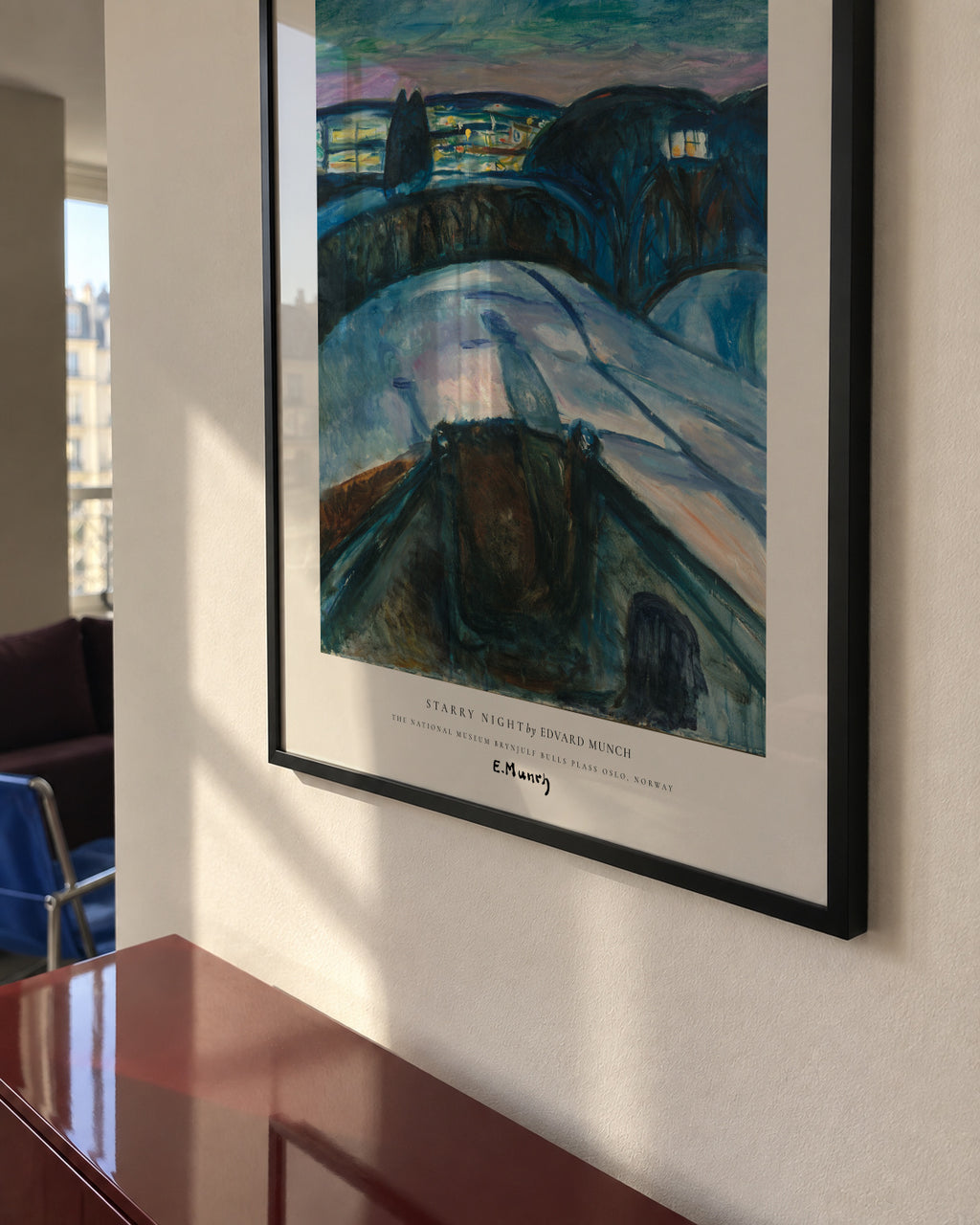 Starry Night by Edvard Munch - Framed poster in an interior