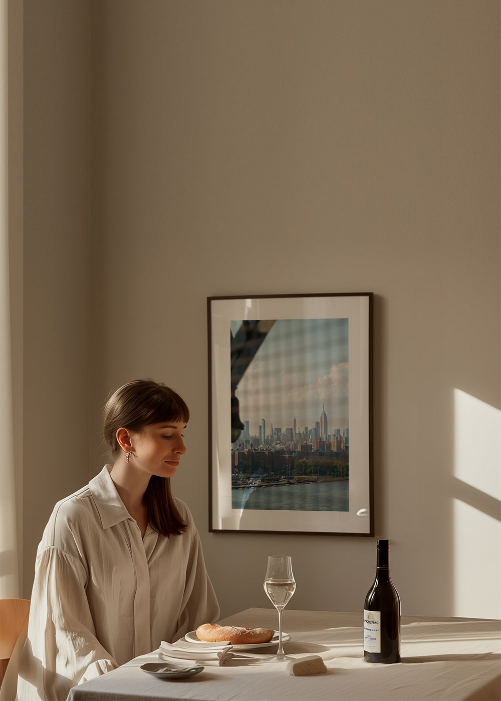 City print showing skyline through a window