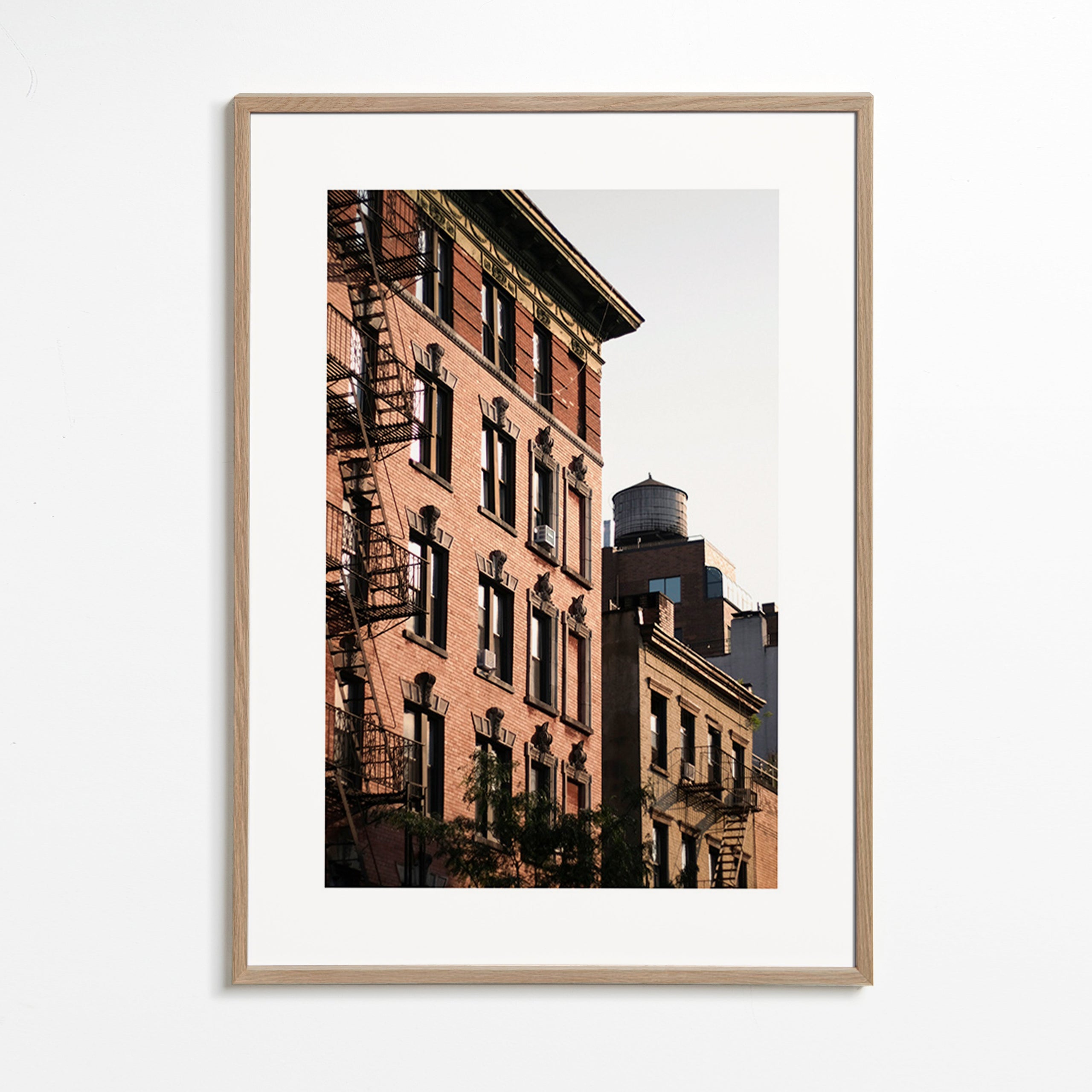 Urban façade photograph with fire escape