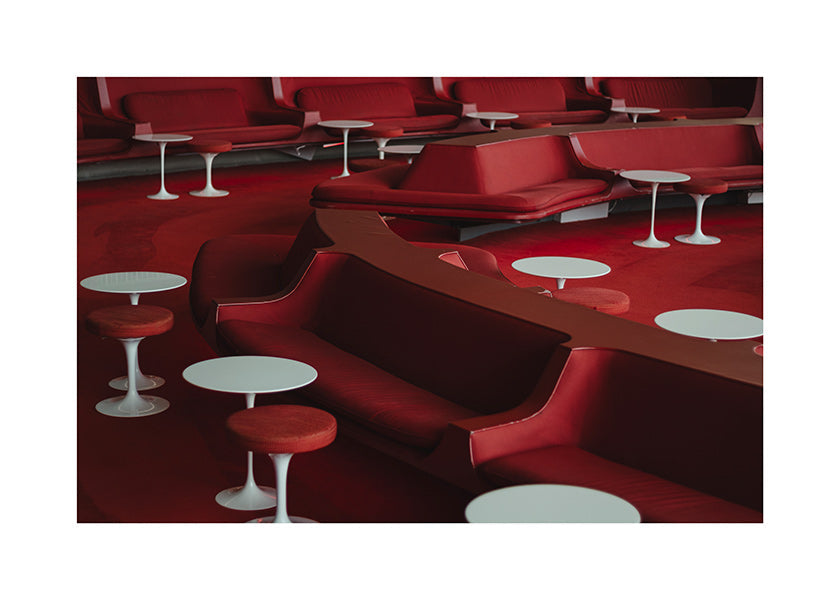 Red lounge photograph with curved seating
