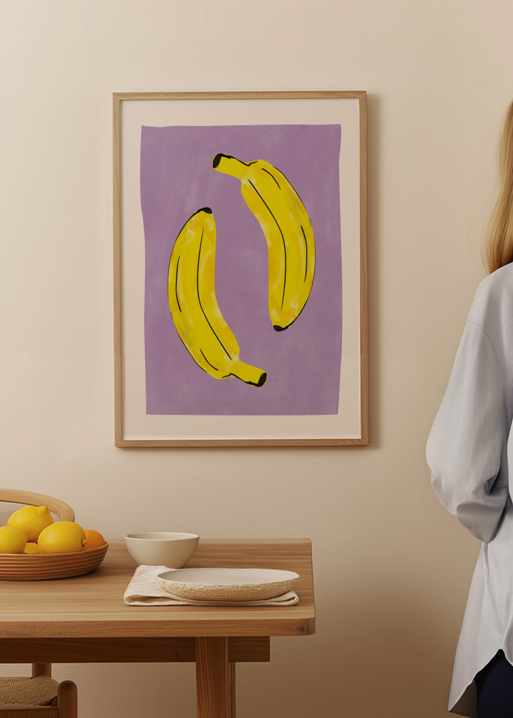 Two Vibrant Yellow Bananas - Framed poster in an interior