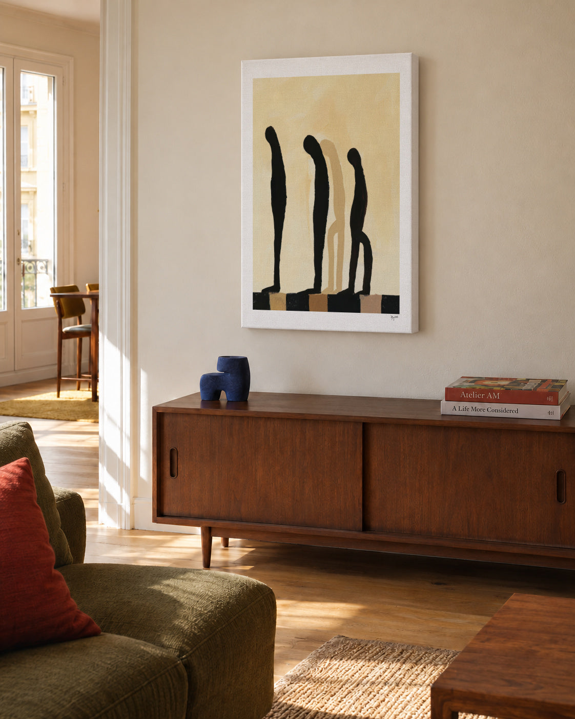 Three Figures I - Unframed canvas in an interior
