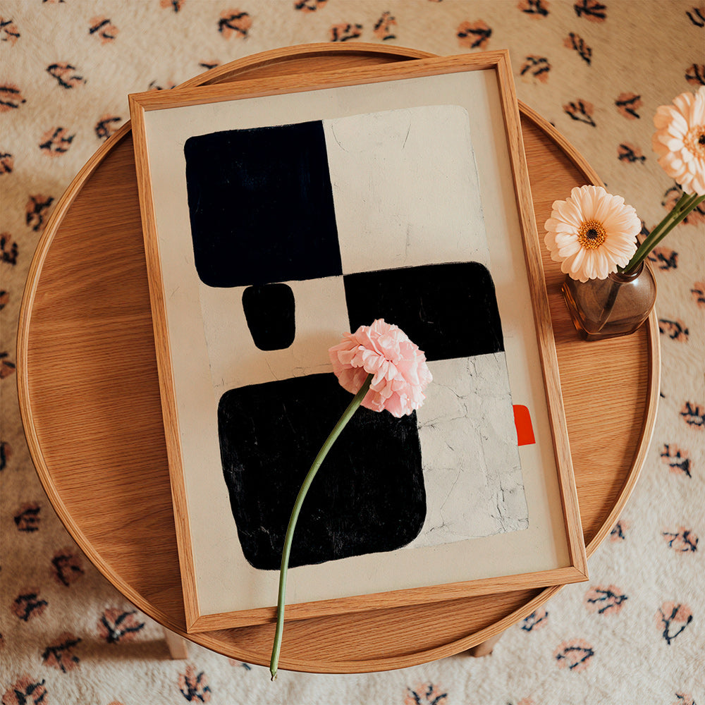 Cuadro geométrico con bloques negros y acento rojo – Product1