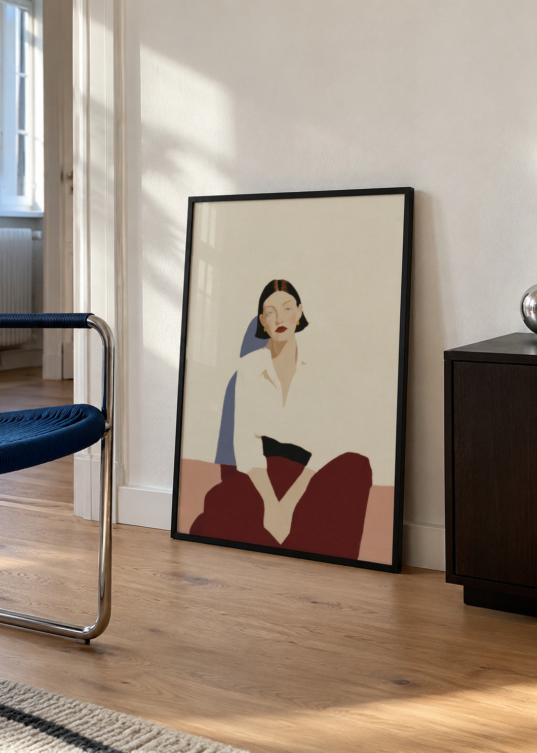 Minimalist Seated Figure - Framed poster in an interior
