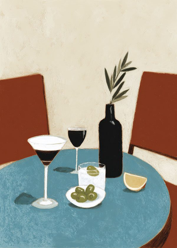 Cuadro de cocina con aperitivo sobre mesa azul