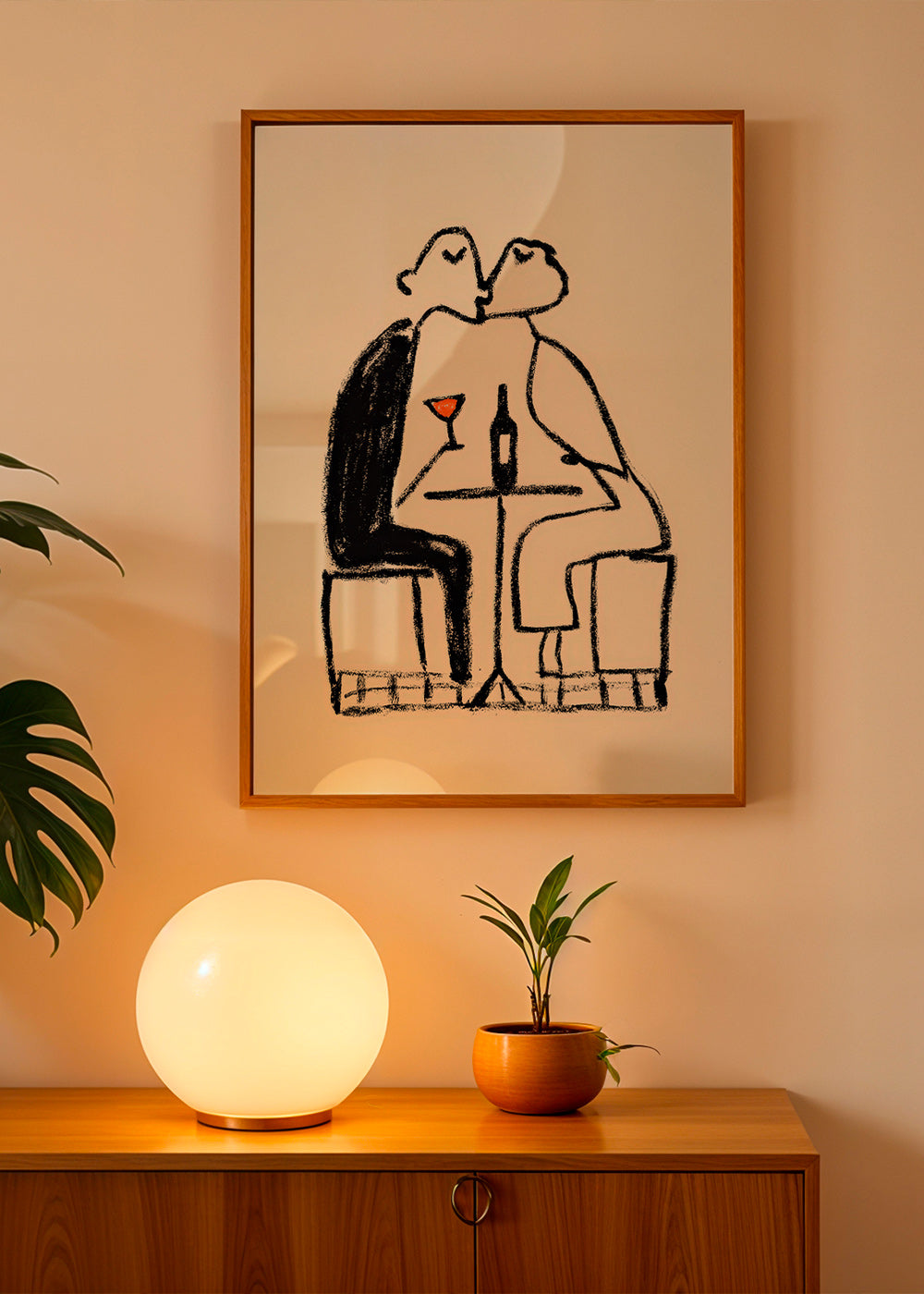 Kitchen art: couple sharing a wine