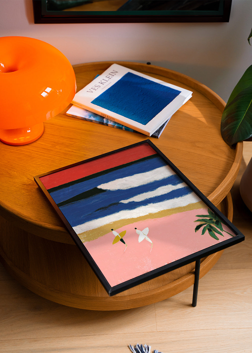 Landscape art with surfers and pink sand