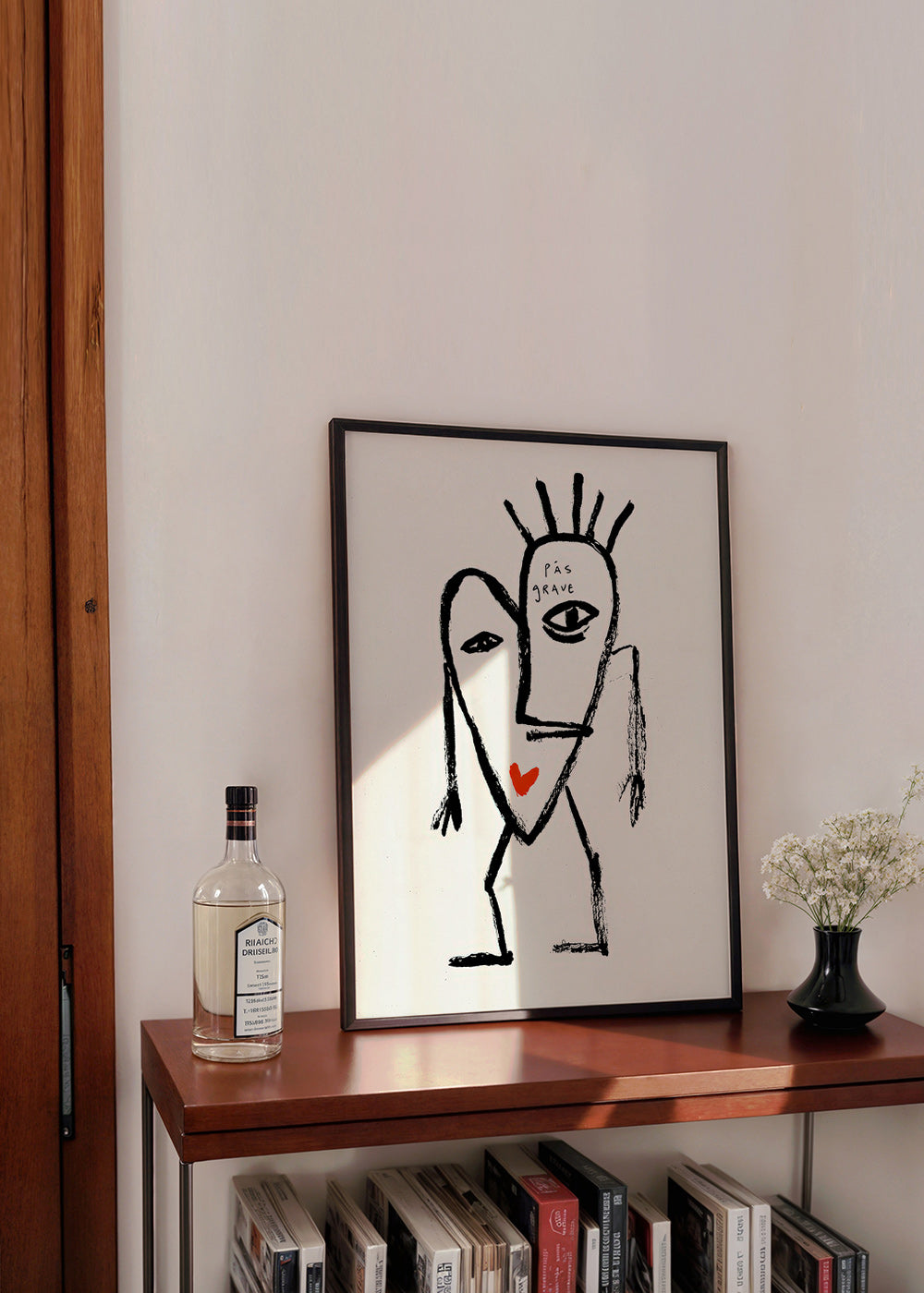 Abstract artwork linear face with red heart