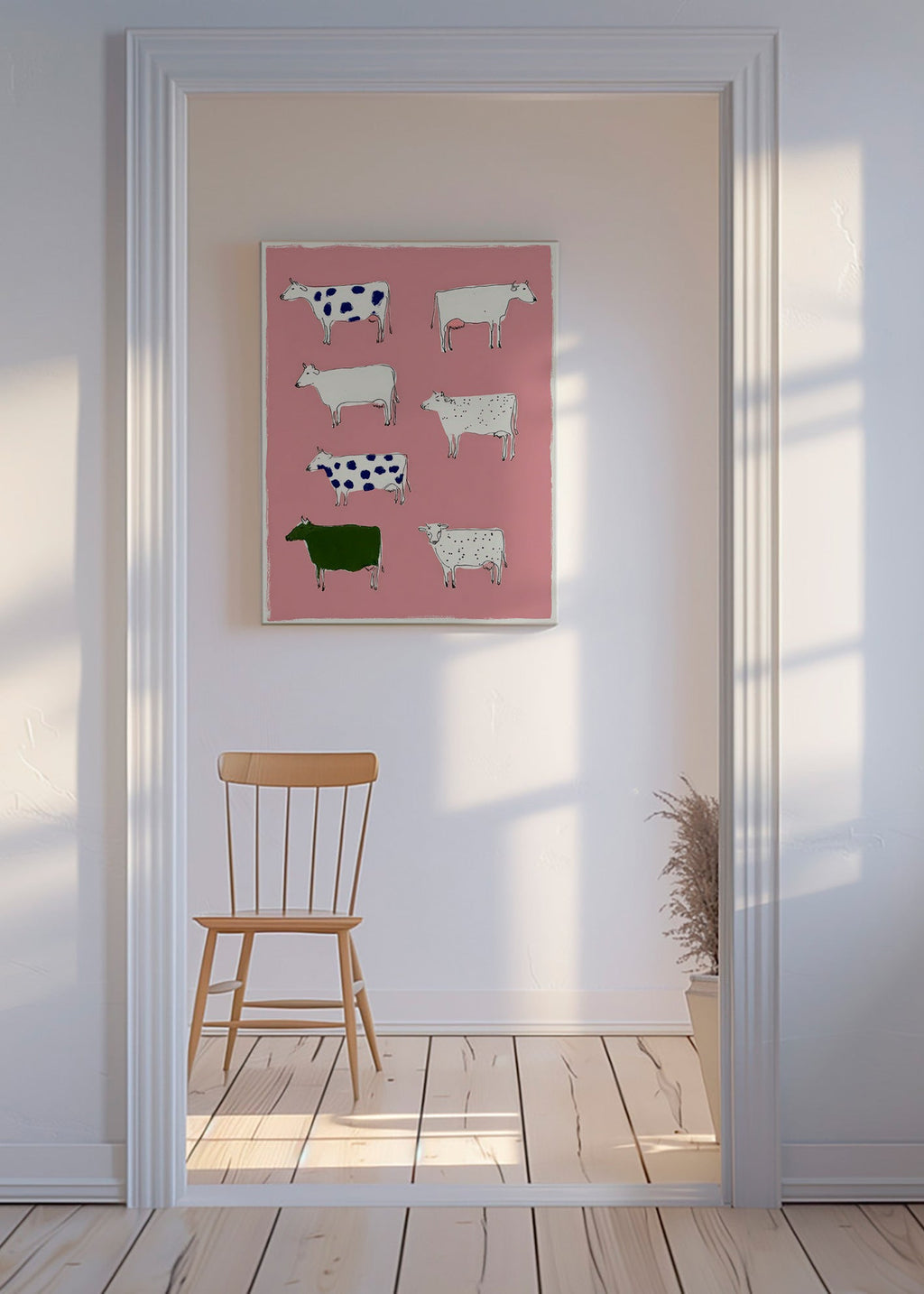 Artwork with playful cows on pink background