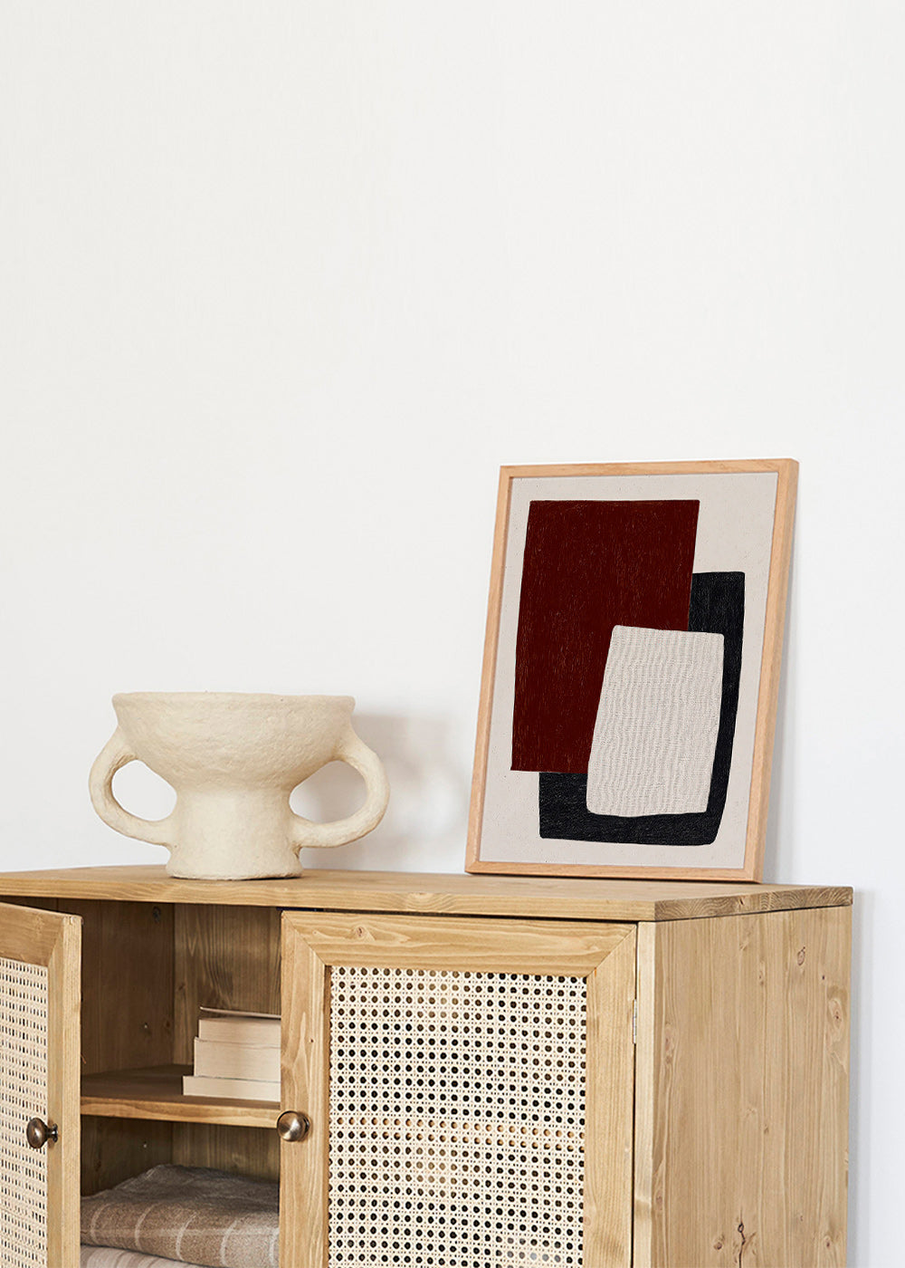 Geometric poster with overlapped burgundy shapes