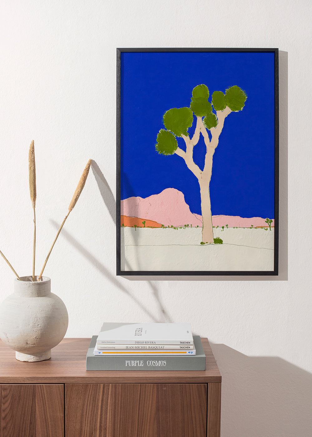 Landscape art: desert tree against vivid blue sky
