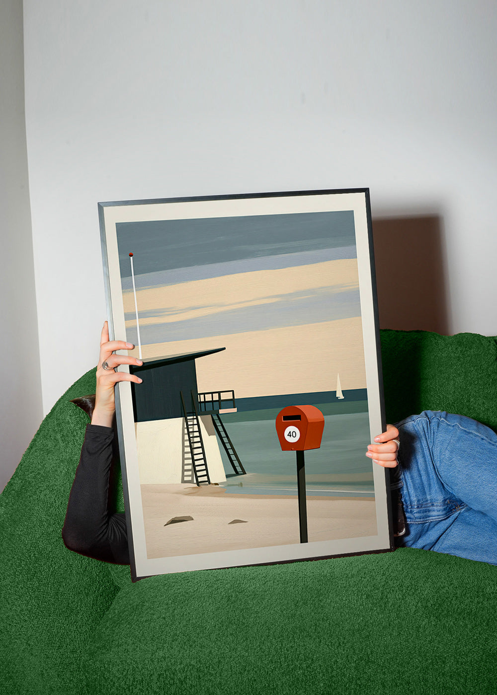 Landscape art with lifeguard hut and red postbox