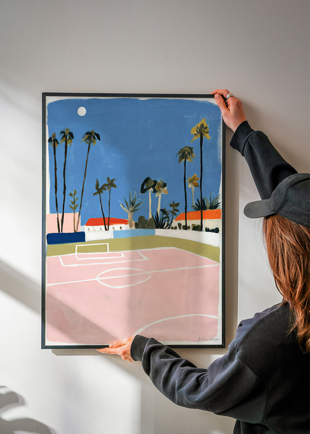 Sports art: pitch framed by palms