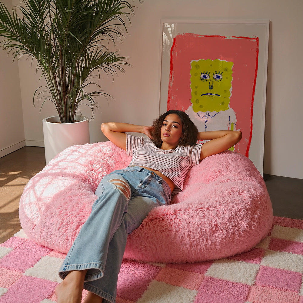 Sponge character illustration on pink background