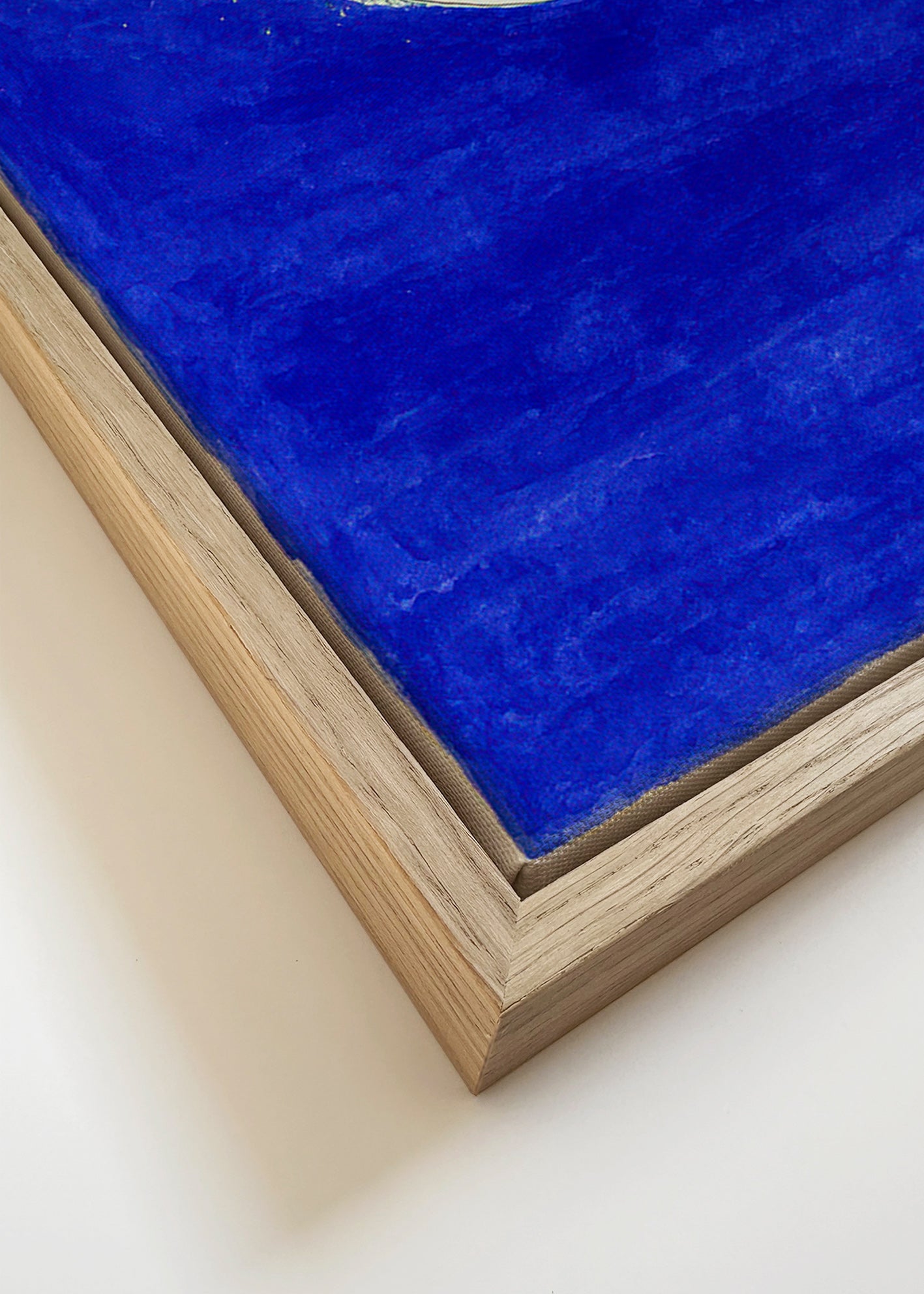 Surf art: surfer on an intense blue wave