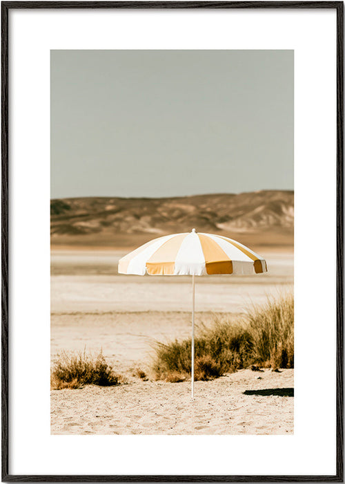 Landscape art with striped beach umbrella