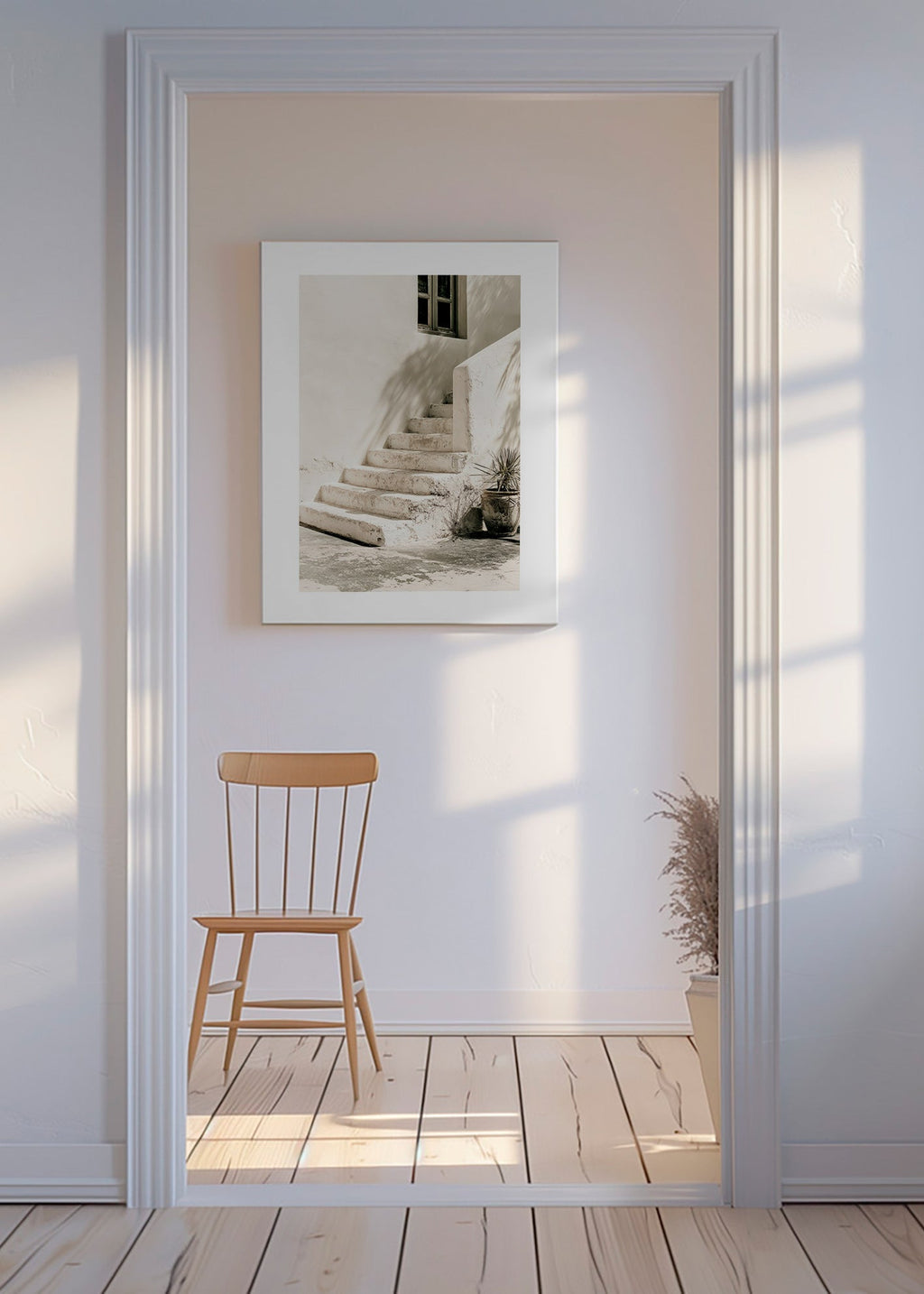 Photograph of white steps with plant