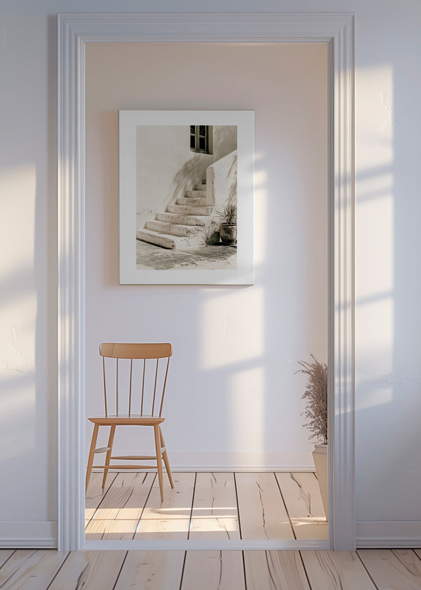 Photograph of white steps with plant