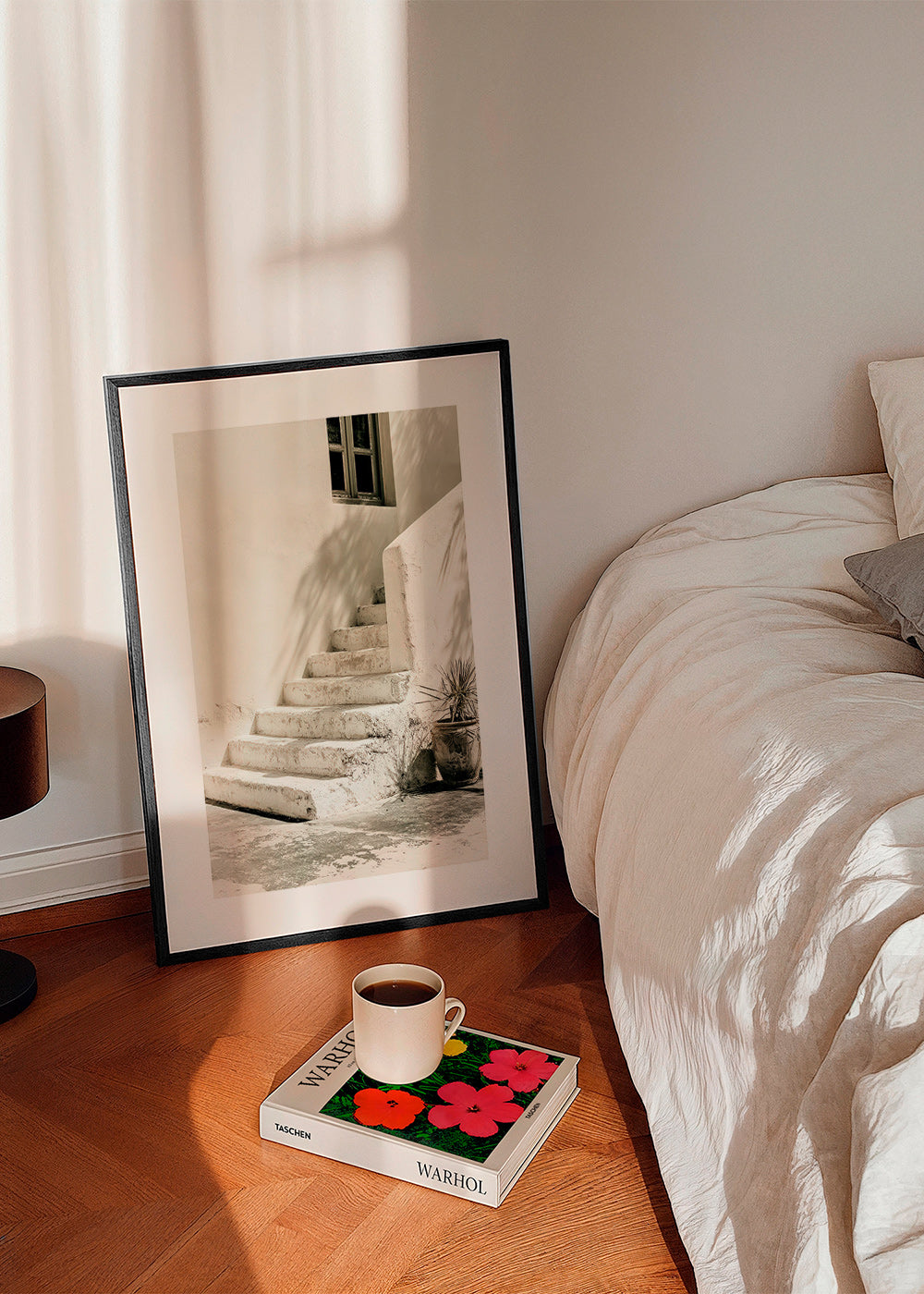 Photograph of white steps with plant