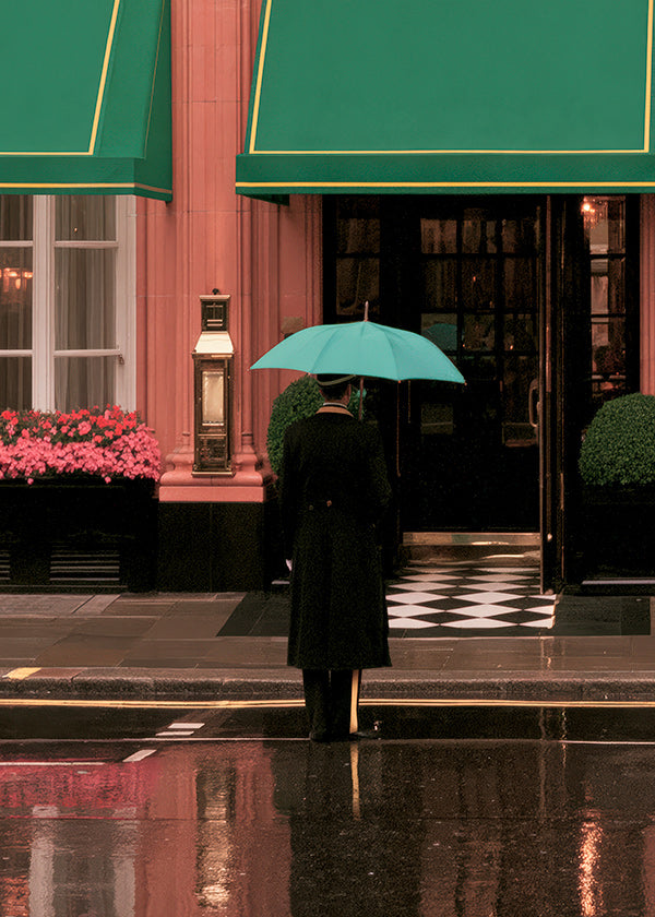 City photograph: lone figure with umbrella and reflections