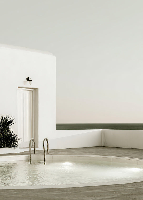 Photograph of a minimalist pool and white architecture