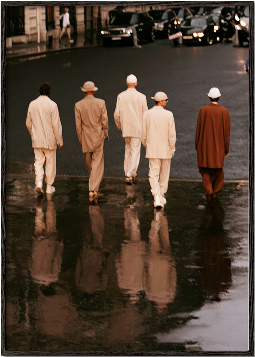Photograph: five figures walking on a wet street