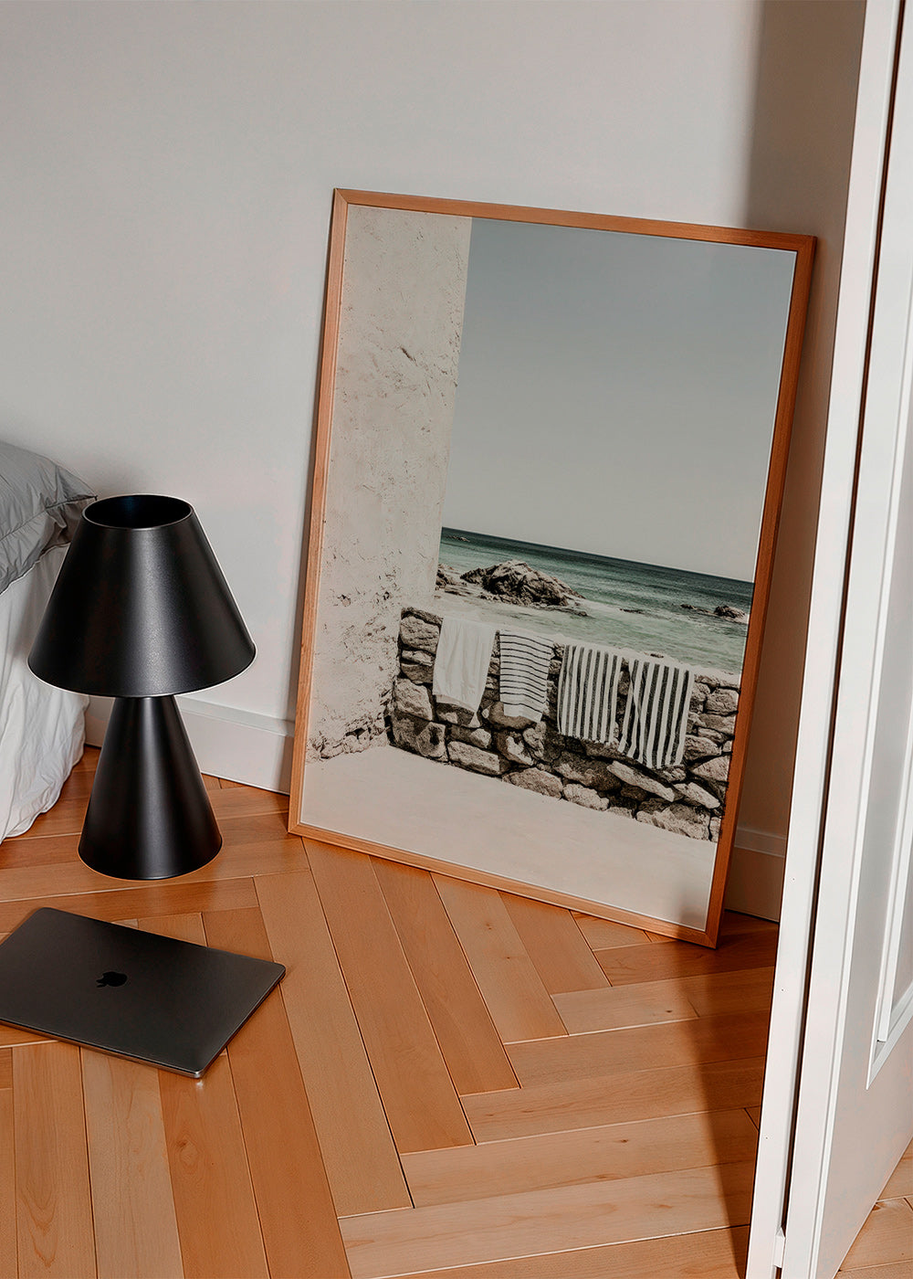 Coastal landscape photograph with hanging towels